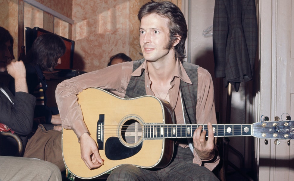 Eric Clapton playing a Martin D-45 Acoustic Guitar