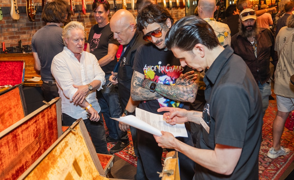 Guests Exploring Guitar Center Hollywood's Premium Vintage Pieces