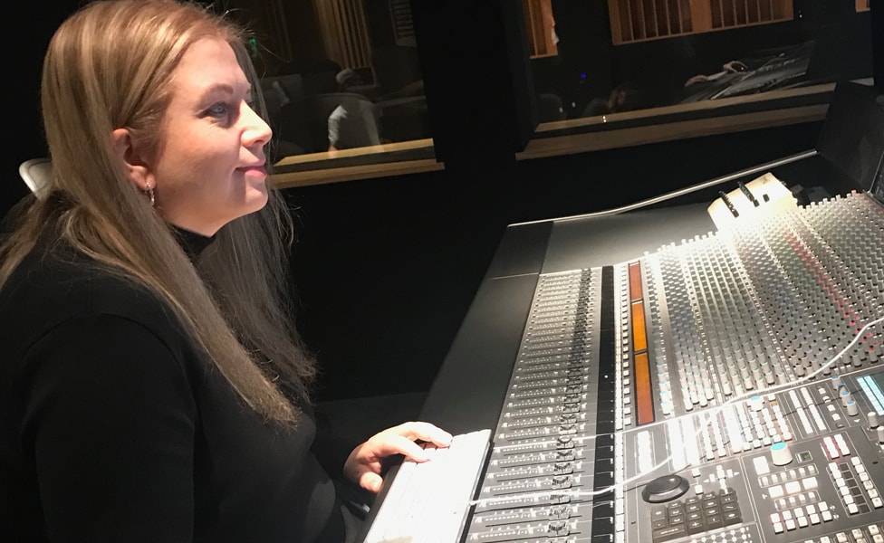 Recording engineer Ann Mincieli working at the console