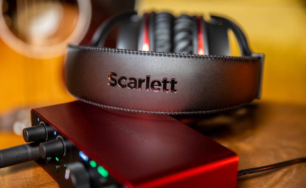Focusrite Scarlett Gen 4 with Scarlett Studio Headphones on top of interface
