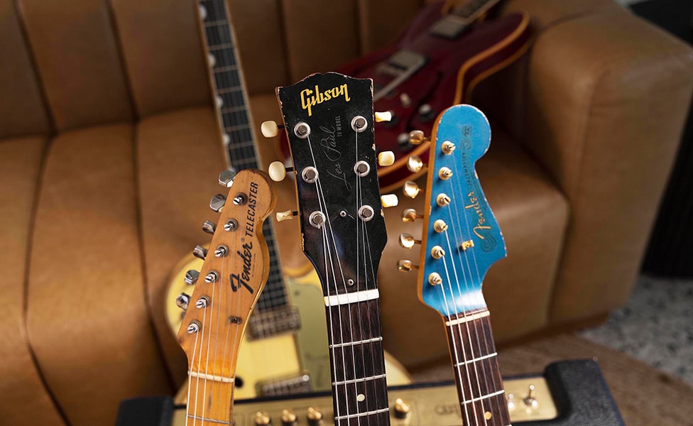 Vintage Guitars and Cars Headstock Group Shot