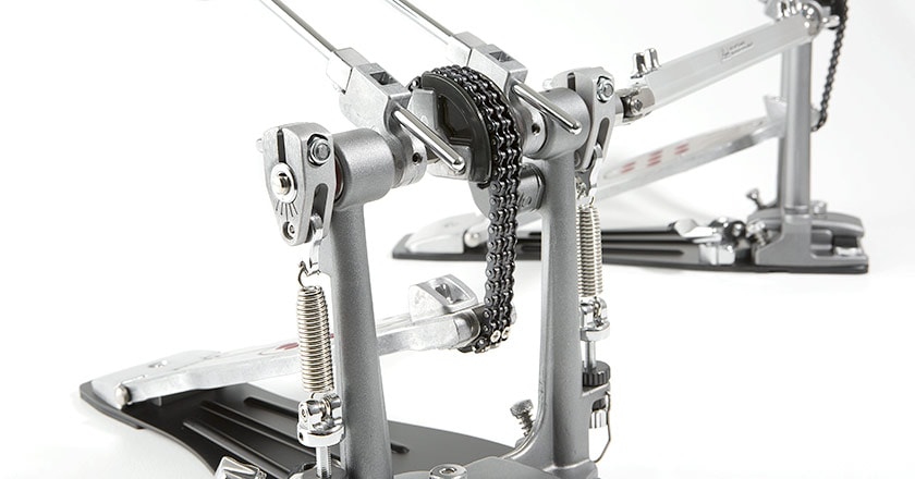 Pearl Eliminator Redline double bass drum pedals with Interchangeable Cam System, including four cams each, color-coded by action