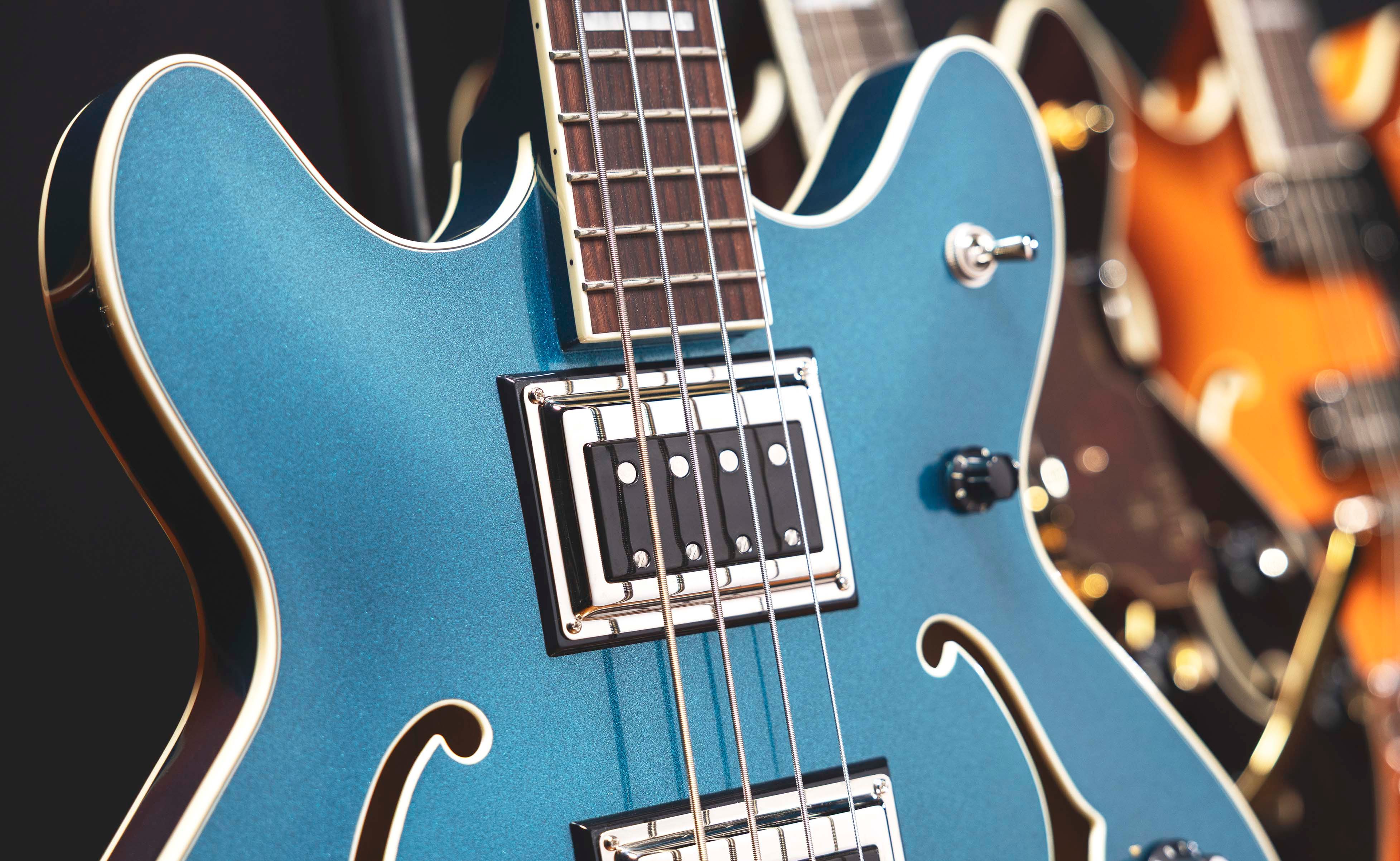Guild_Starfire_Deluxe_Electric_Bass_Guitar_Teal_the_Deal_Inline.jpg