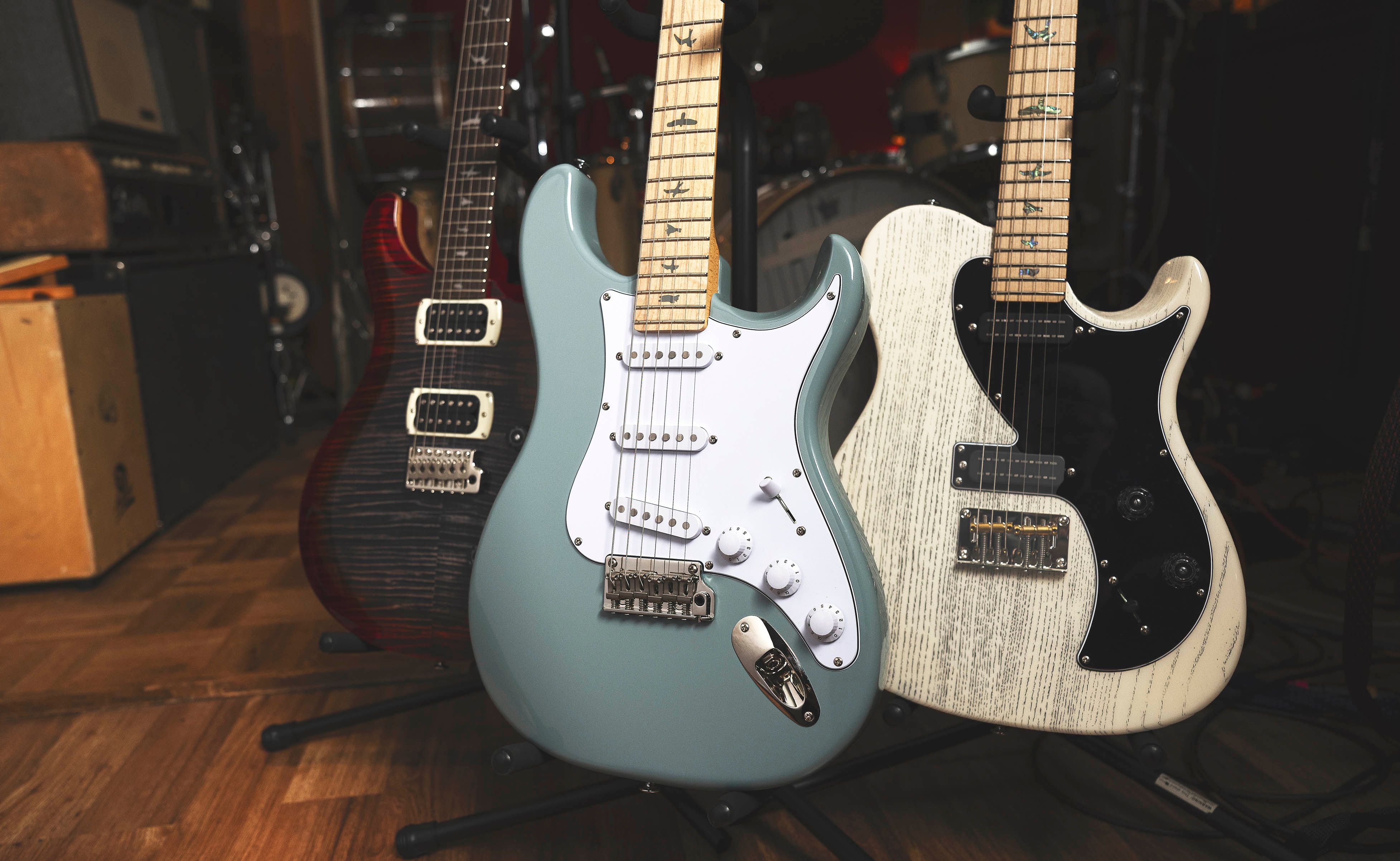 PRS_SE_Custom_24_NF53_Silver_Sky_Group_Shot_Inline.jpg