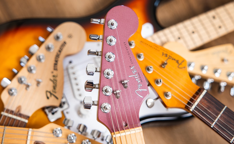 Group Shot of Fender Stratocaster Headstocks Ranging From 1985—Present