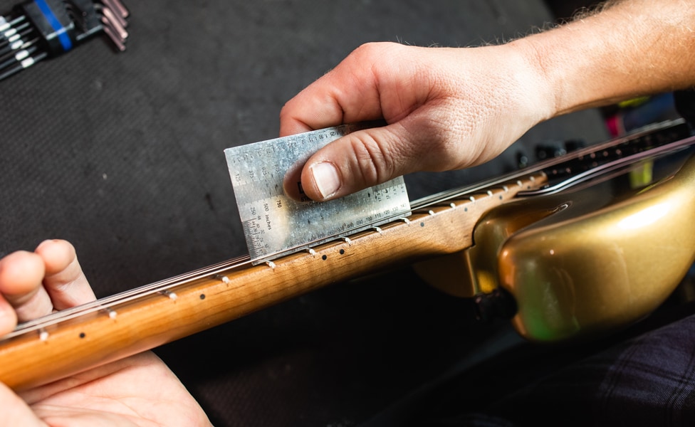 Checking string height on a Fender Stratocaster