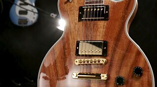 Josh Smith Demos the Gibson Les Paul KOA Solid Body Electric Guitar Natural
