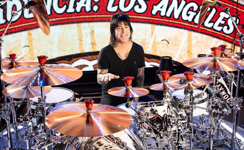 Alex González sitting at his DW Collector Series Custom Drums