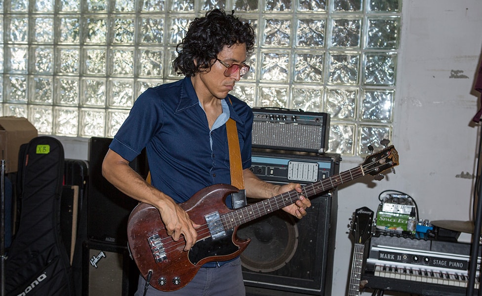 Guitarist, bassist and producer Eduardo Arenas with his vintage Gibson bass