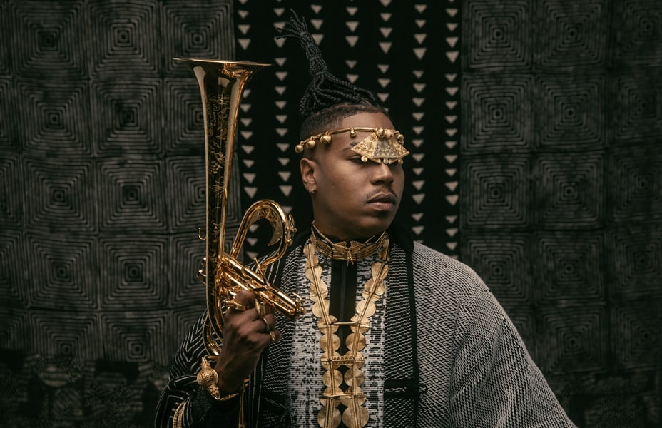 Christian Scott posed with his trumpet