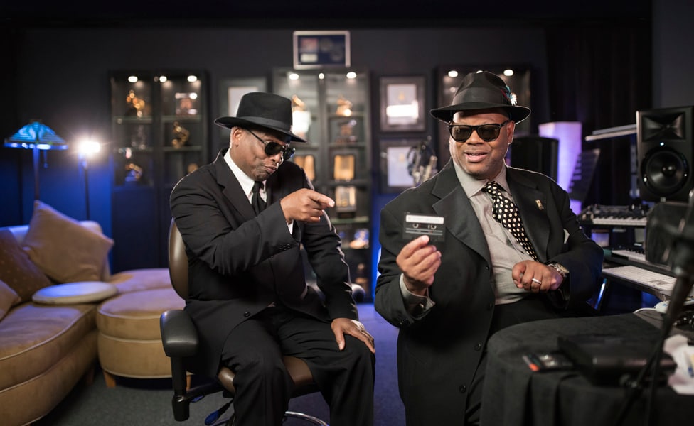 Jimmy Jam and Terry Lewis holding up the cassette that would be become "Volume One"