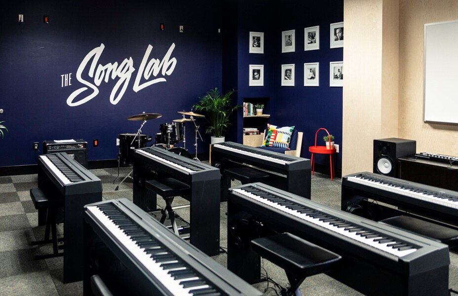 Song Lab set-up of keyboards for students at Stax Music Academy