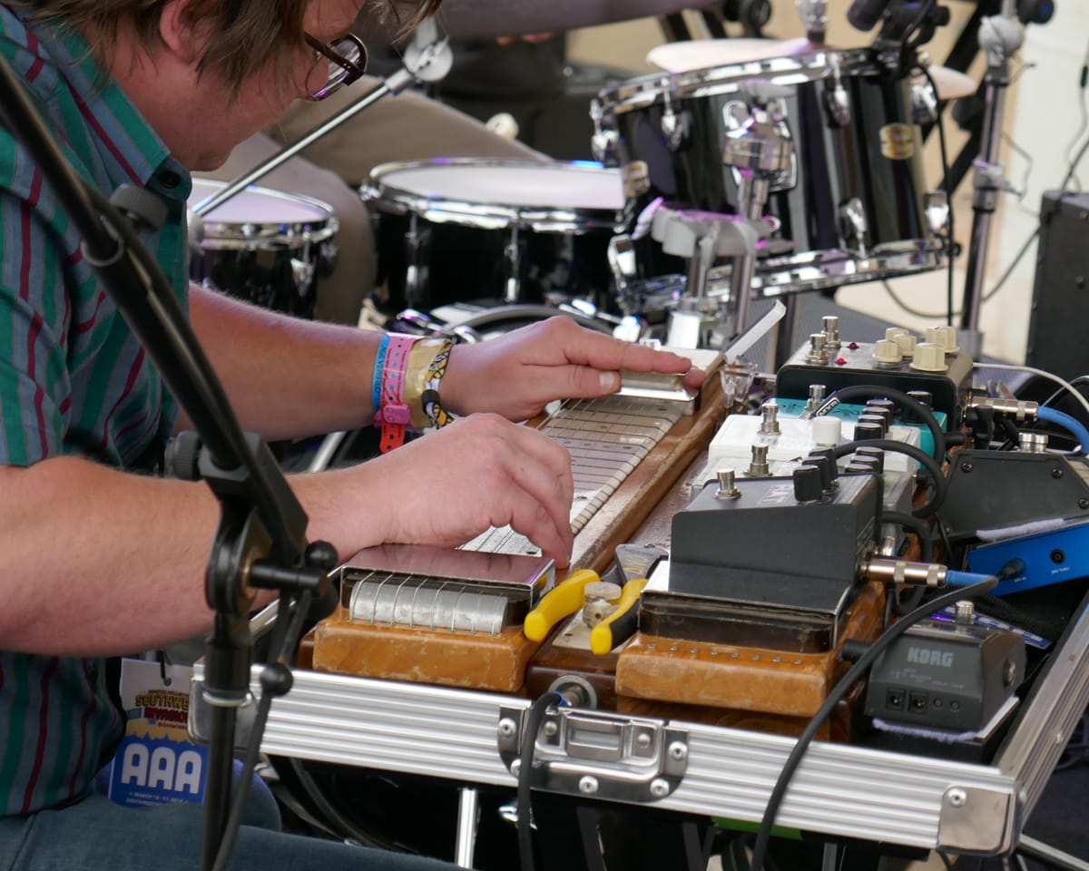 Blake of Becca Mancari's band plays his lap steel guitar