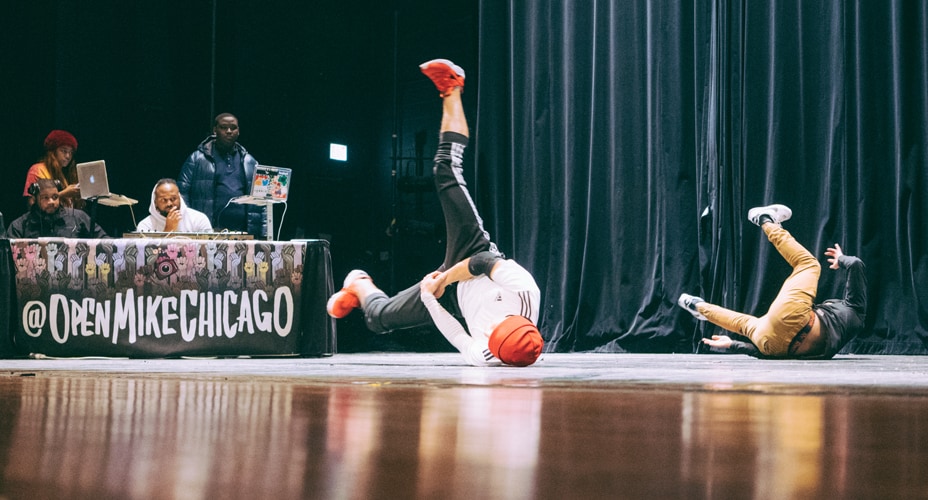 Break dancers perform at a 2019 OpenMike event