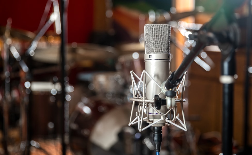 Neumann U 87 setup as a room microphone when recording drums