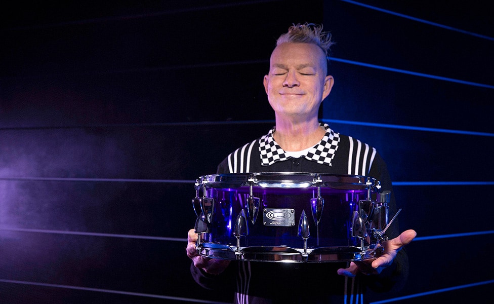 Adrian Young (No Doubt) Holding OCDP 14x5.5 Acrylic Snare Drum in Nightglow Fade