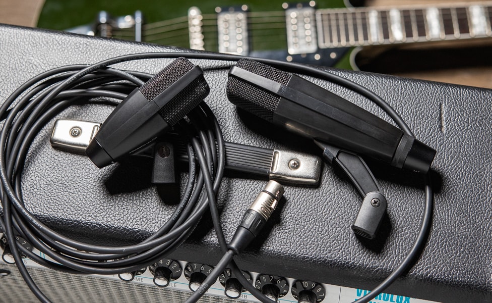 Sennheiser MD 421-II and Sennheiser MD 421 KOMPAKT on top of Fender amplifier