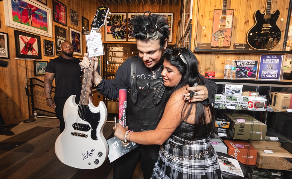 YUNGBLUD Signs a Fan's YUNGBLUD Epiphone SG Junior at Guitar Center Hollywood