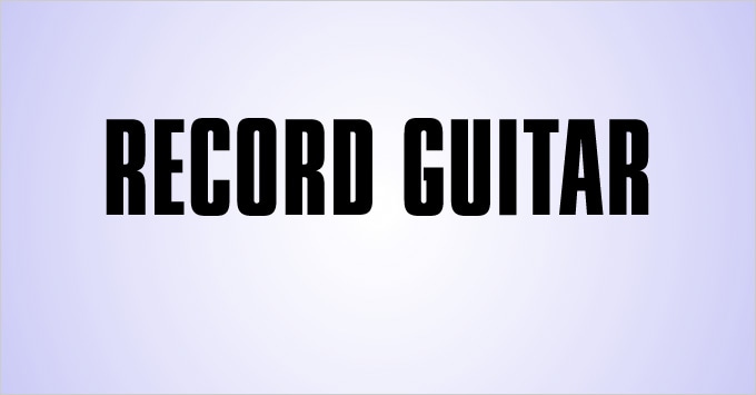 Recording guitar.