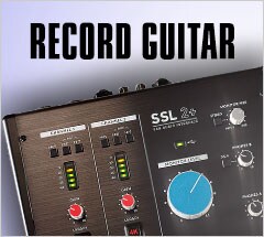 Recording guitar.