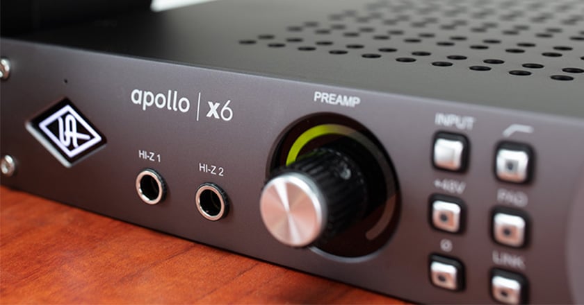 Close-up of Apollo x6's front left-hand side with preamp gain knob and UA logo.
