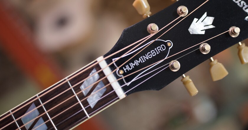 Up-close neck view of 2019 Hummingbird Vintage Series, round profile