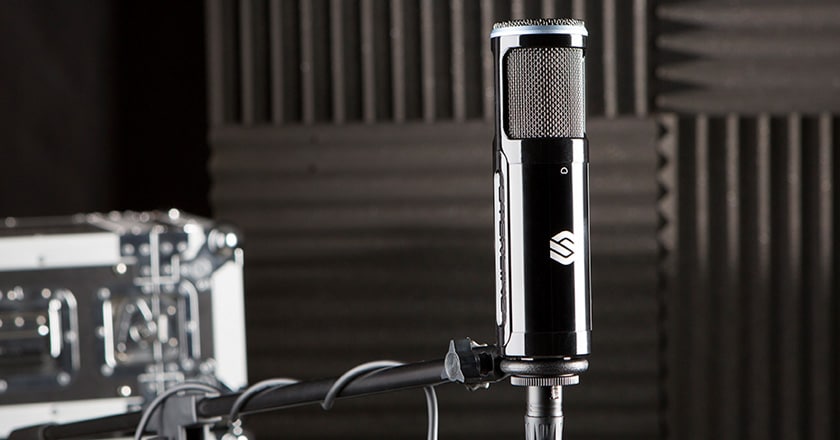 The Sterling SP150 Microphone in its Mic Clip on a Microphone Stand