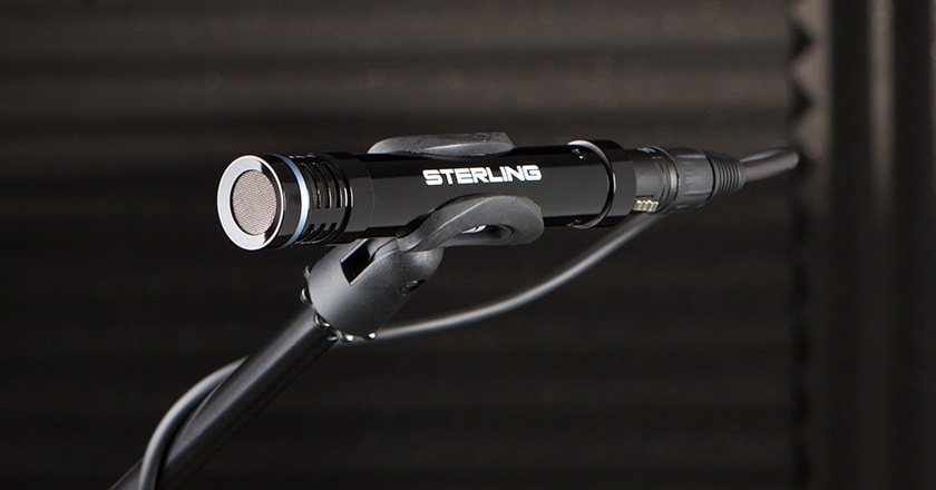 The Sterling SP130 Microphone in its Mic Clip on a Microphone Stand