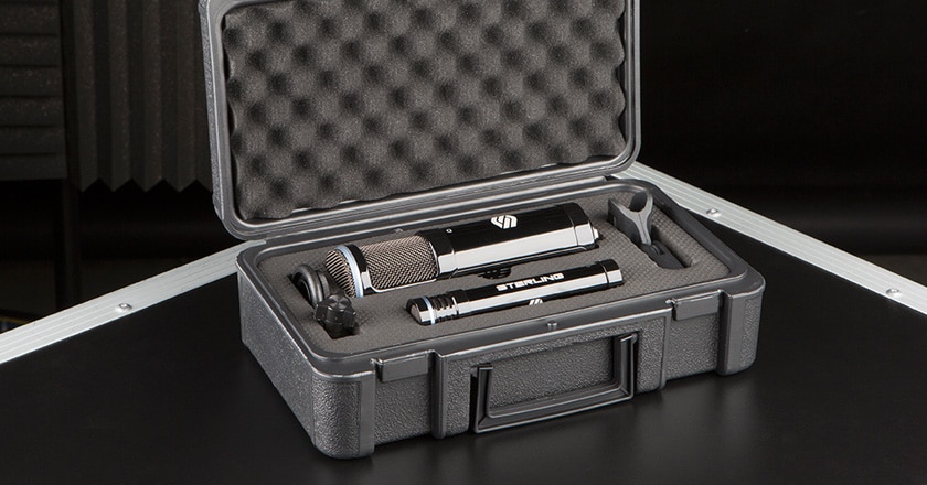 The Sterling SP150/130 Microphone Pack is Pictured in Its Rugged Plastic Carry Case